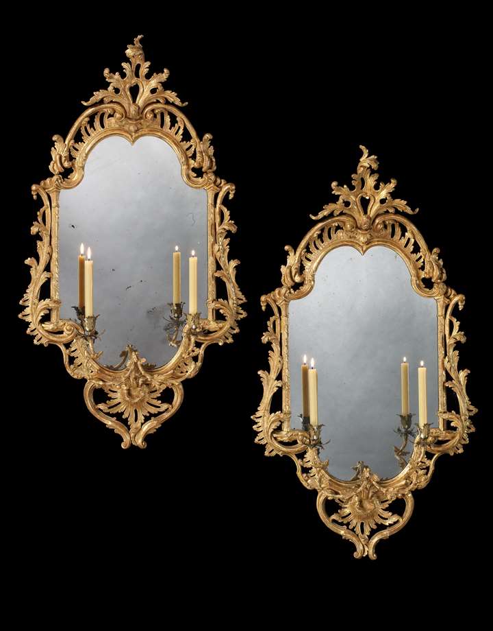 A PAIR OF GEORGE III GILTWOOD TWO LIGHT GIRANDOLES